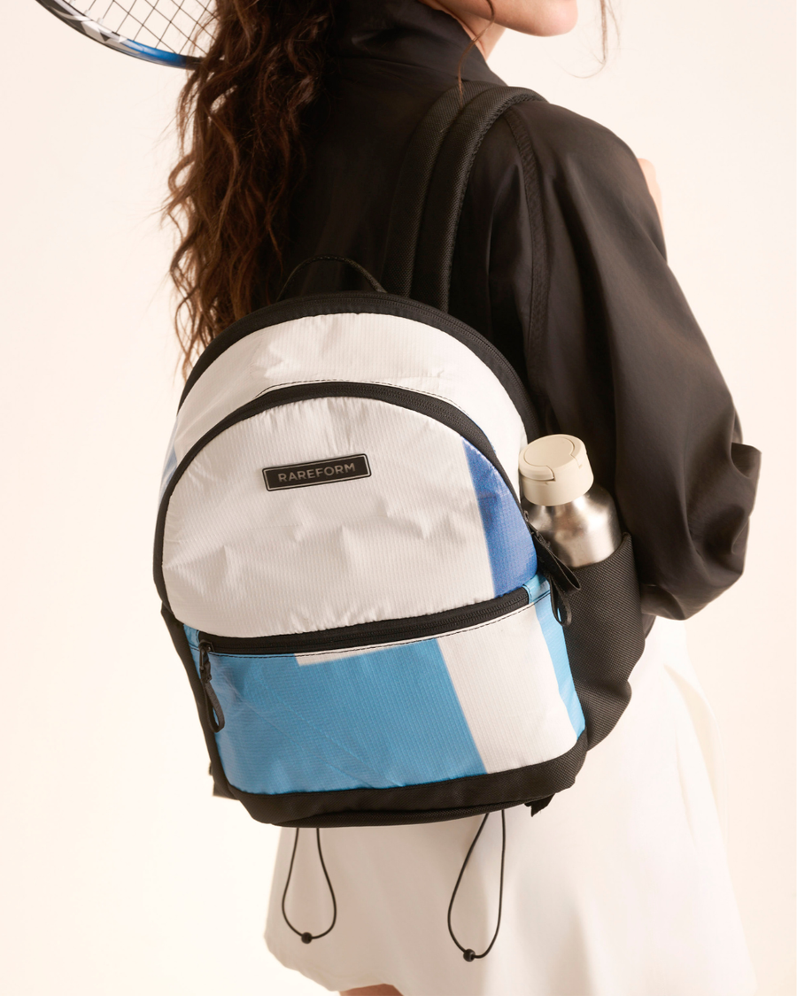 Woman wearing the everyday backpack, one of the cooler beach bags for hands-free days